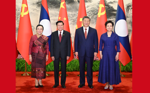 习近平同老挝人民革命党中央总书记、国家主席通伦举行会谈