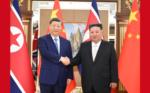 习近平出席金正恩举行的欢迎仪式